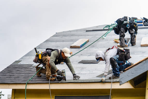 Professional Gutter Installation technician working in Tussy, OK